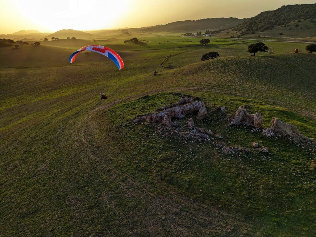 Exploring old ruins during a sunset cross country flight with Sky Riders. This stunning photo was taken in Southern Spain