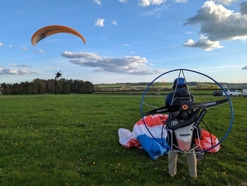 Coming in to land after the glastonbury tor cross country paramotor flight. Paramotor Training and Pilot rating with Sky Riders