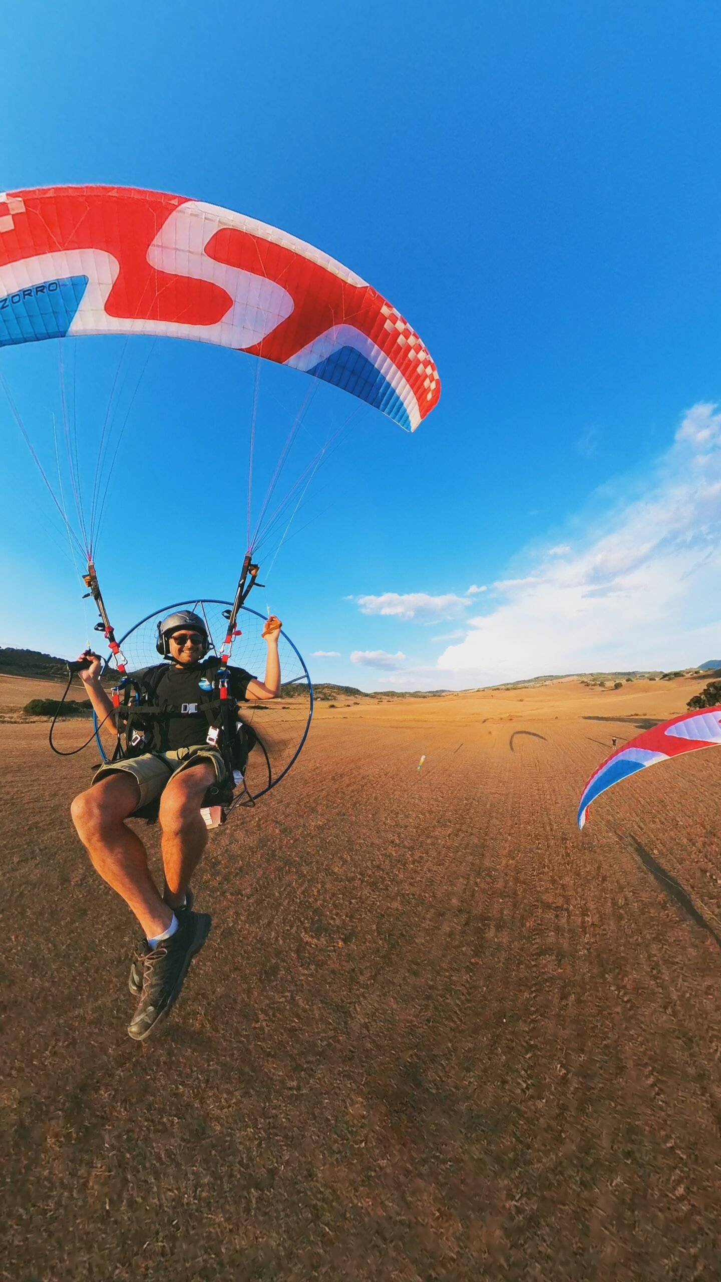 Sky Riders CFI Tom, low flying his parajet maverick paramotor in spain on a paramotor adventure holiday.