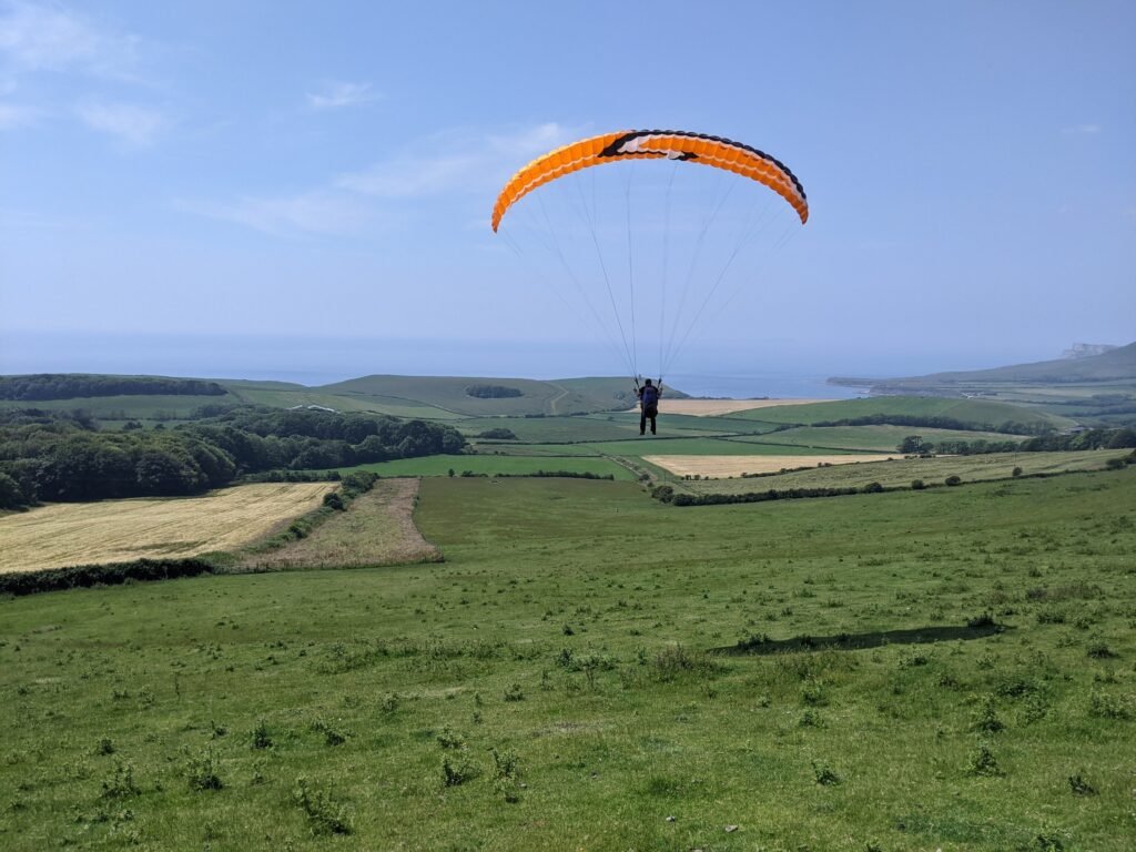 Paraglider beginner training courses at Kimmeridge Bay with Sky Riders